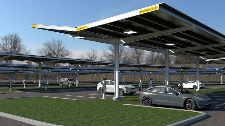 How can parking lots be transformed into income-producing solar canopies?